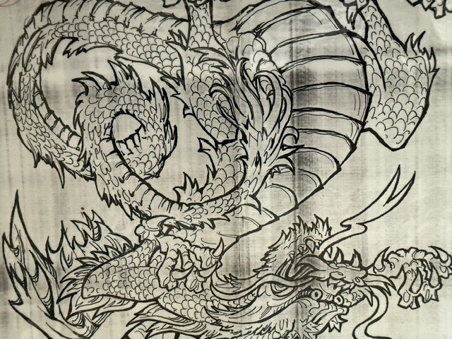 Detailed drawing of intertwined dragons by Cat Voss