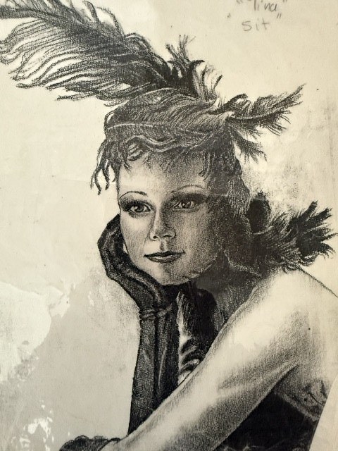 Portrait of a woman in a feathered headdress by Cat Voss