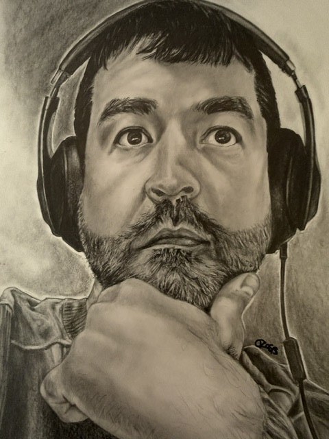 Graphite portrait of a man wearing headphones by Cat Voss